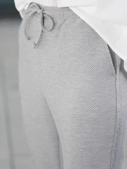 Pantalon ceinture élastique latérale et au dos