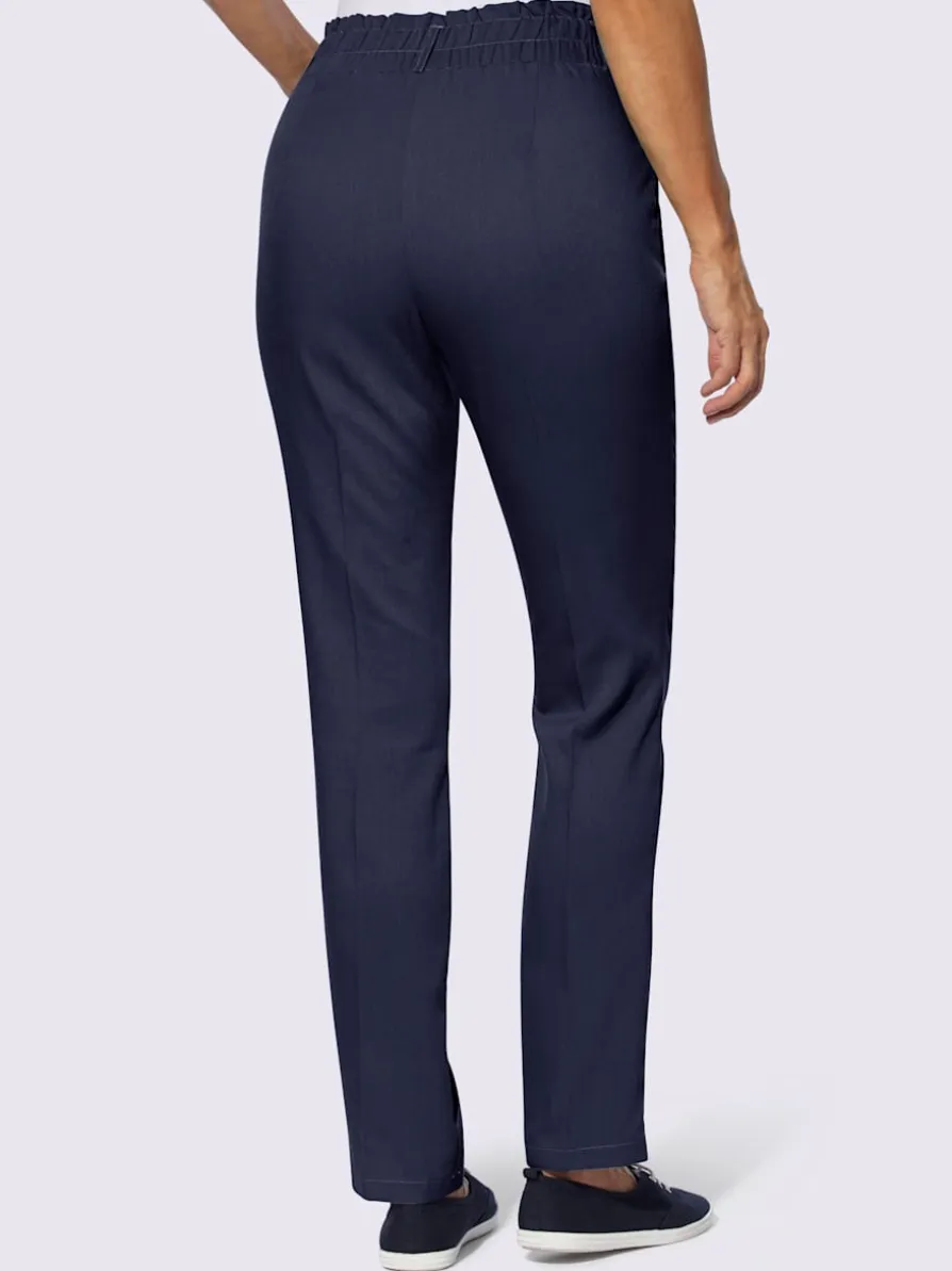 Pantalon plis repassés, effet affinant