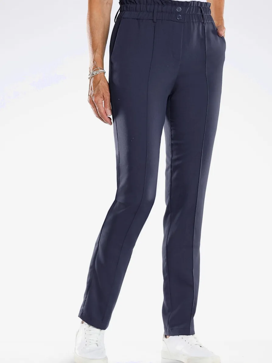 Pantalon plis repassés, effet affinant
