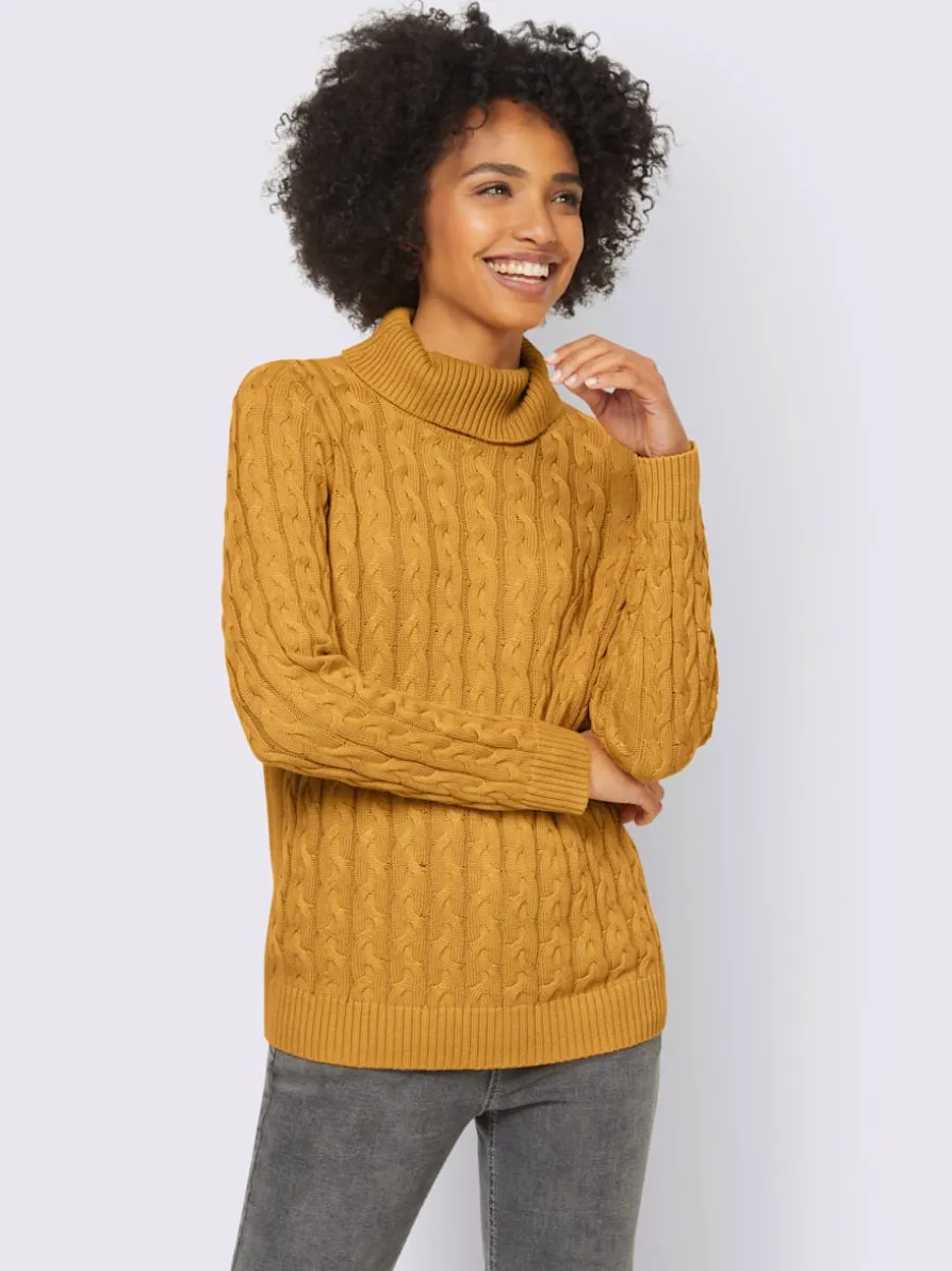Pull en tricot fin motif torsadé classique