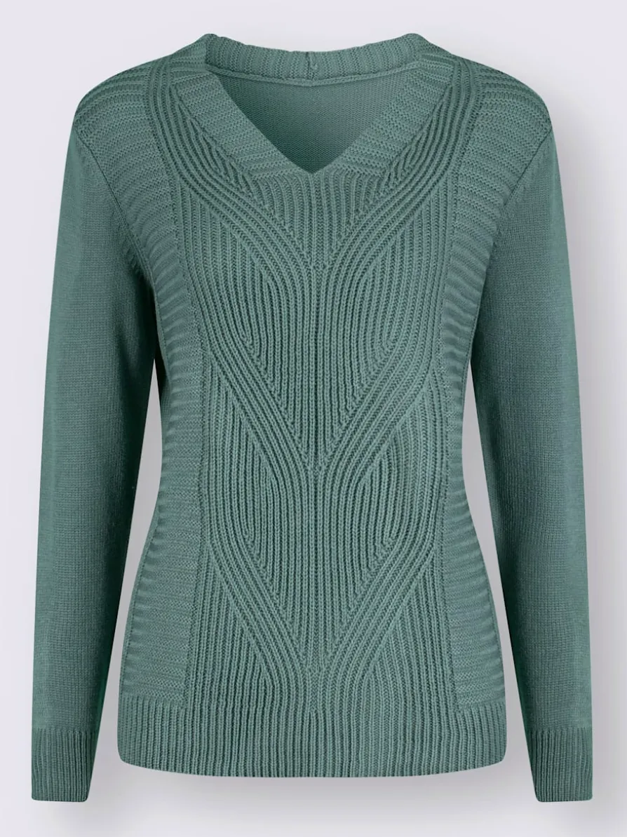 Pull à manches longues motif torsadé devant