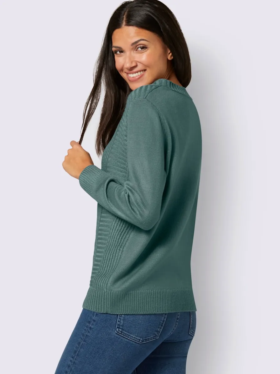 Pull à manches longues motif torsadé devant