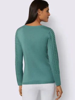 Pull à manches longues motif tricoté devant