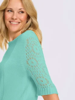 Pull motif ajouré à la manche