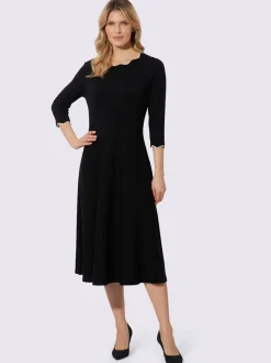 Robe en tricot bord ondulé élégant à l'encolure