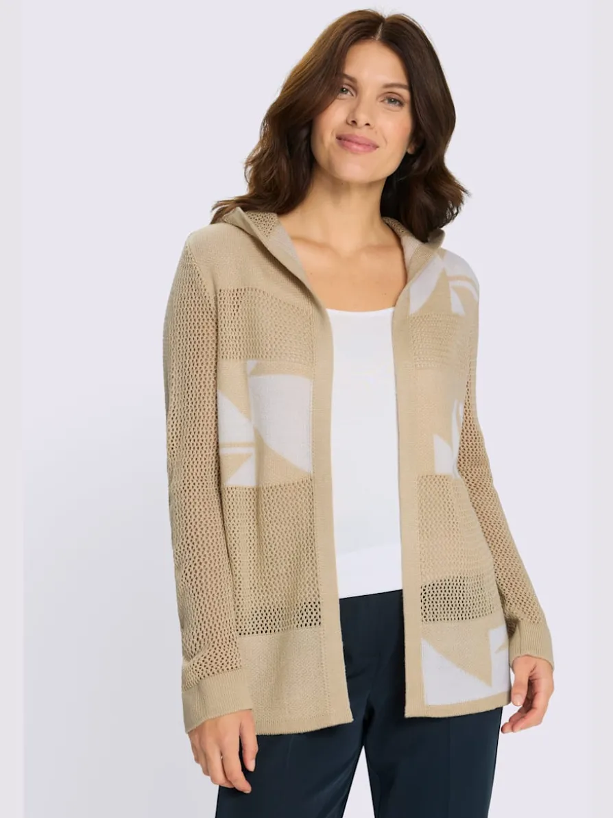 Veste en tricot ajouré à capuche