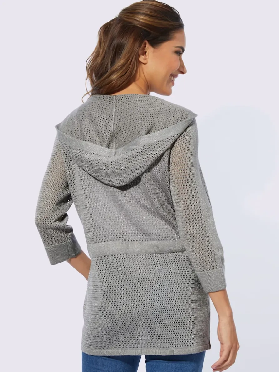 Veste en tricot ajouré coupe longue affinante