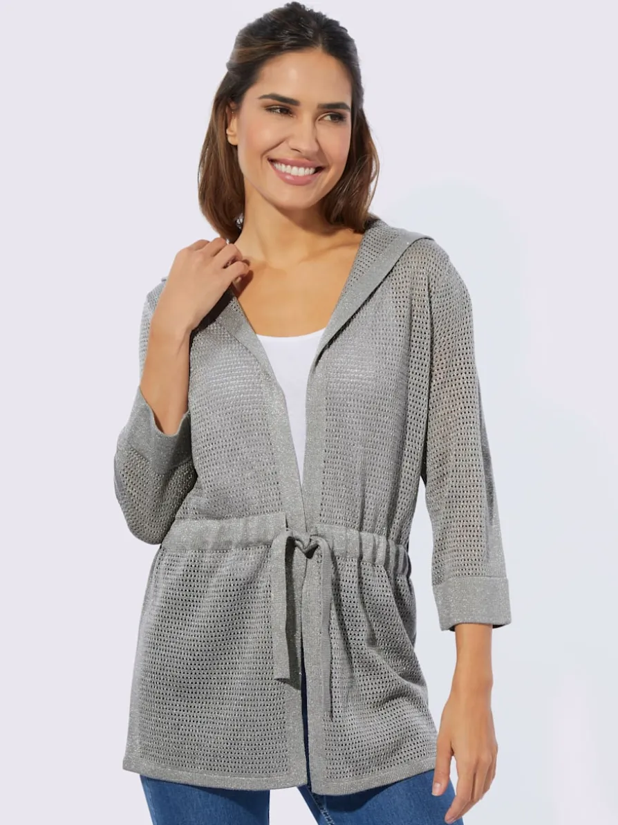 Veste en tricot ajouré coupe longue affinante