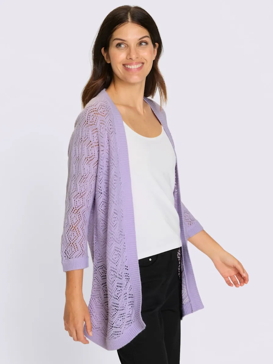 Veste en tricot ajouré coupe ouverte affinante
