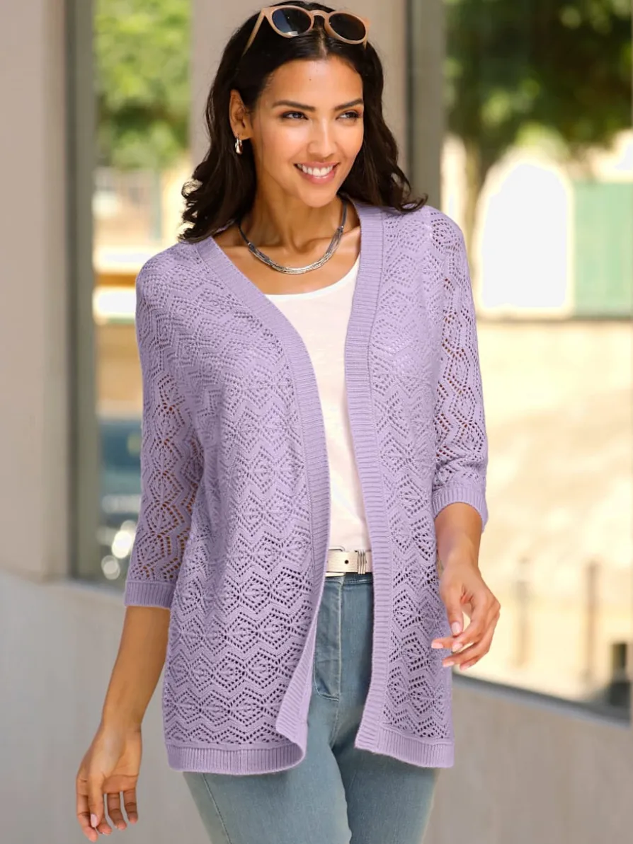 Veste en tricot ajouré coupe ouverte affinante