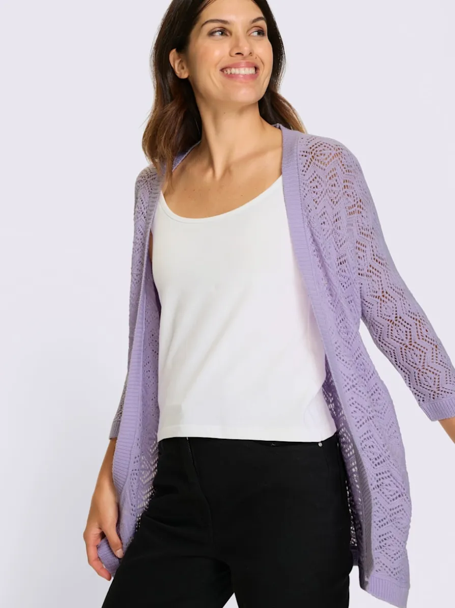 Veste en tricot ajouré coupe ouverte affinante