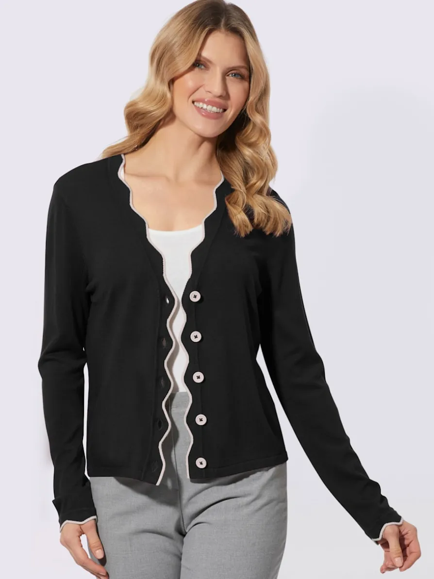 Veste en tricot manches et col à finitions ondulées