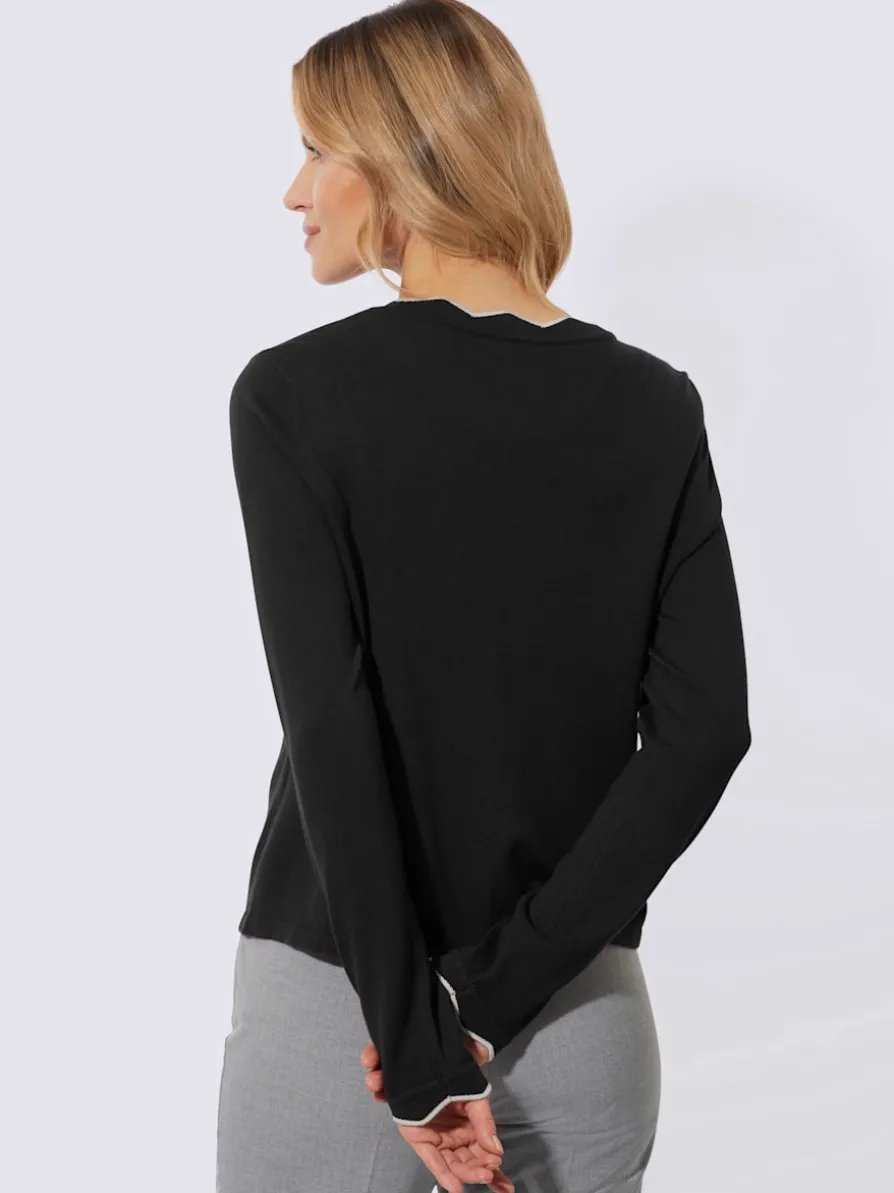 Veste en tricot manches et col à finitions ondulées