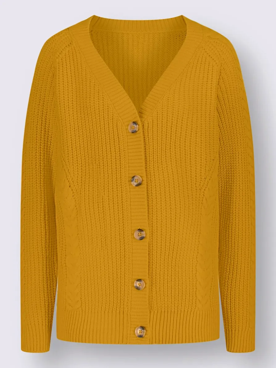 Veste en tricot manches raglan avec joli motif torsadé