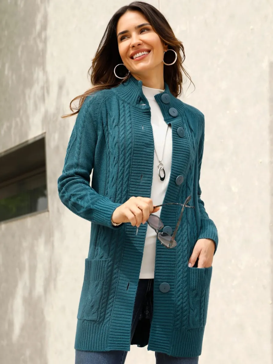 Veste en tricot superbe motif torsadé